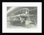 Transport workers washing a tram at the Holloway Car Shed, London, 1932 by Unknown