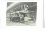 Transport workers washing a tram at the Holloway Car Shed, London, 1932 by Unknown
