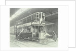 Transport workers washing a tram at the Holloway Car Shed, London, 1932 by Unknown
