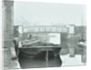 Man mooring a barge by a river bank, Poplar, London, 1905 by Unknown