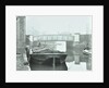 Man mooring a barge by a river bank, Poplar, London, 1905 by Unknown