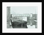 Man mooring a barge by a river bank, Poplar, London, 1905 by Unknown