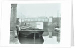 Man mooring a barge by a river bank, Poplar, London, 1905 by Unknown