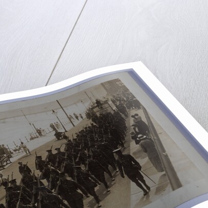 First World War soldiers marching through Ramsey by George Bellett Cowen