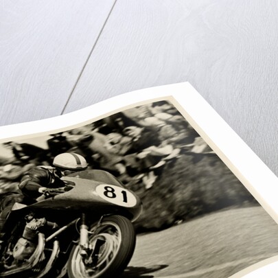 John Surtees riding as number 81 at Kate's Cottage, 1956 Senior TT (Tourist Trophy) by T.M. Badger