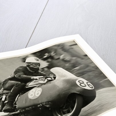 John Hartle, riding a Norton (number 86), 1957 Junior TT (Tourist Trophy) by T.M. Badger