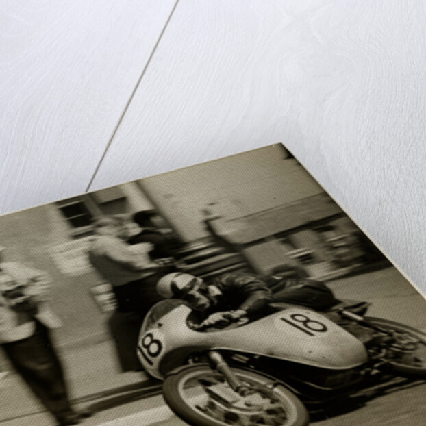 Fron Purslow, aboard 124cc Ducati (number 18), 1958 125 TT (Tourist Trophy) by T.M. Badger