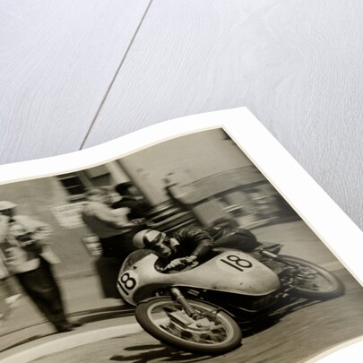Fron Purslow, aboard 124cc Ducati (number 18), 1958 125 TT (Tourist Trophy) by T.M. Badger