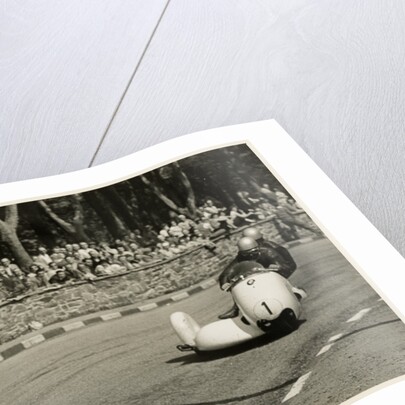 Walter Schneider aboard a BMW sidecar outfit (number 1), 1958 Sidecar TT (Tourist Trophy) by T.M. Badger