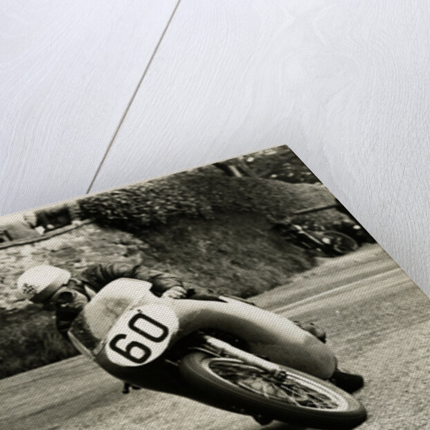 Eric Hinton, TT (Tourist Trophy) rider, riding 500cc Norton (number 60) by T.M. Badger