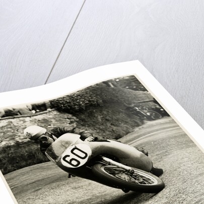 Eric Hinton, TT (Tourist Trophy) rider, riding 500cc Norton (number 60) by T.M. Badger