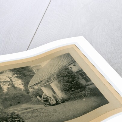 Margaret Lace (known as 'Mother Lace') spinning outside her cottage by George Bellett Cowen