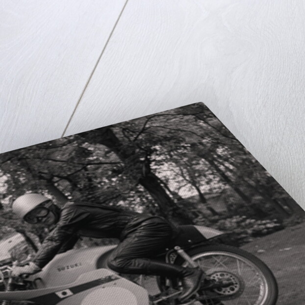 Japanese rider on motorcycle (possibly from Suzuki) by Manx Press Pictures