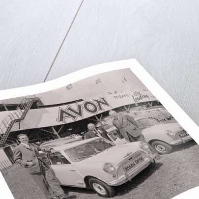 Lieutenant Governor, Sir Ronald Herbert Garvey, with 'roads open' mini motorcar by Manx Press Pictures