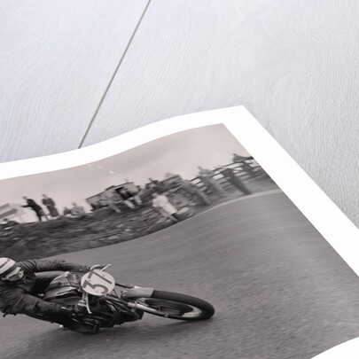 Motorcycle rider no.37 at the Sign Post, (possibly Manx Grand Prix) by Manx Press Pictures