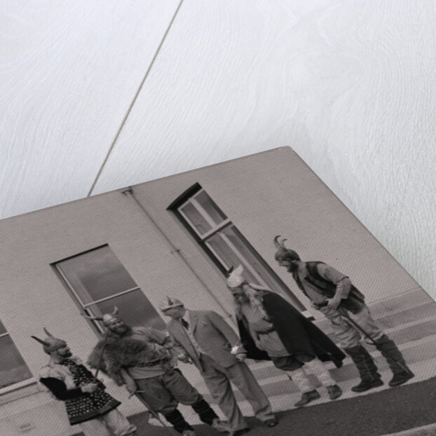 Lieutenant Governor Sir Ronald Herbert Garvey given a Viking helmet by Manx Press Pictures