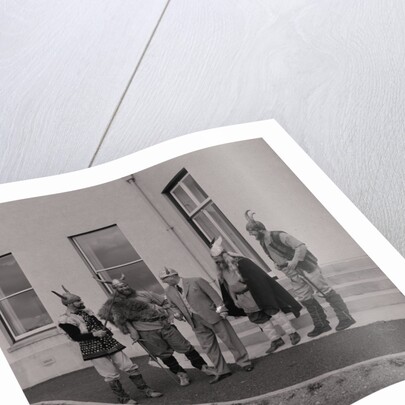 Lieutenant Governor Sir Ronald Herbert Garvey given a Viking helmet by Manx Press Pictures