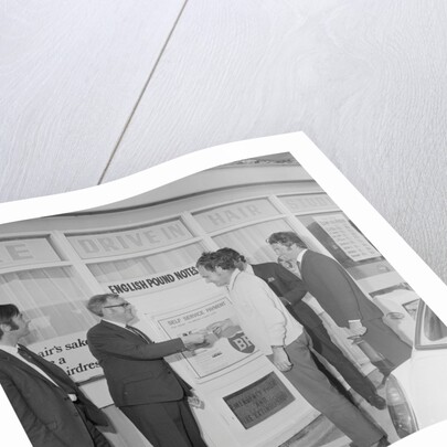 Geoff Duke at petrol station auto pay kiosk by Manx Press Pictures