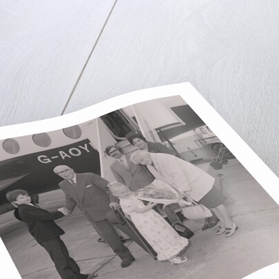 Visitors to the Isle of Man for 70 years arrive at Ronaldsway Airport by Manx Press Pictures