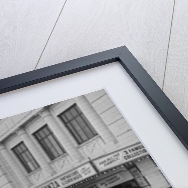 Austin Seven motorcars outside the Crescent cinema by Manx Press Pictures