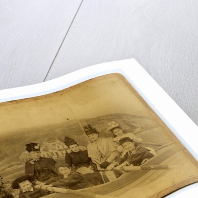 Members of the Harrison family pictured as if in rowing boat by Spence Lees