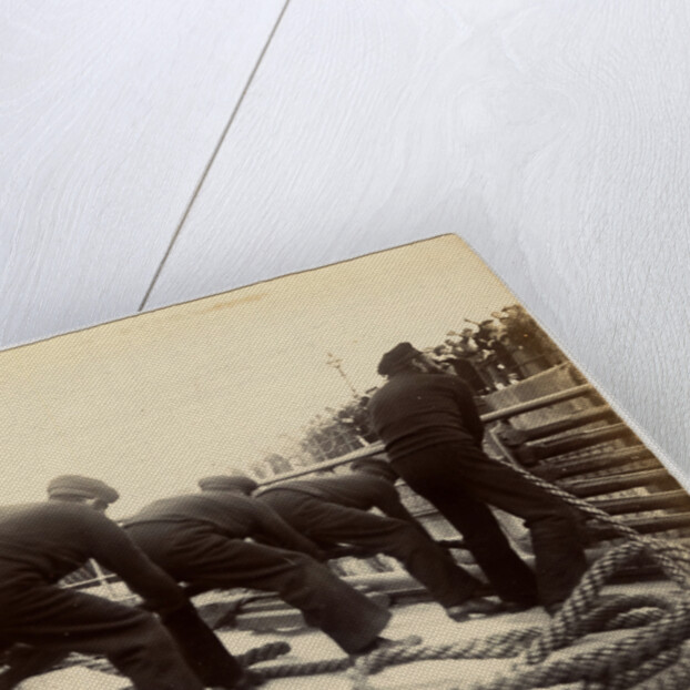 Sailors putting rope on a steamer by Anonymous