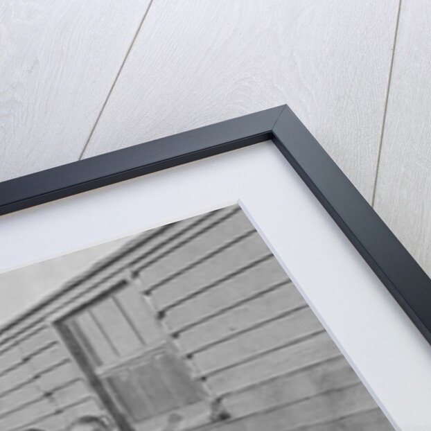 First World War Internee in front of hut with medical/hospital staff, Camp 2, Knockaloe by W H Warburton