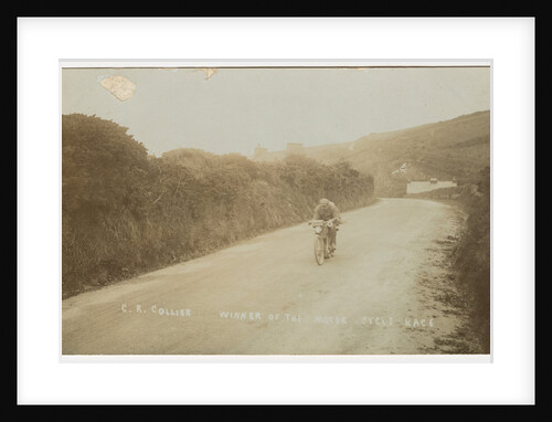 Rider passing along Kirk Michael to Peel coast road, captioned ‘C.R.Collier, winner of the motorcycle race’, likely to be 1907 TT (Tourist Trophy) by Anonymous