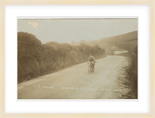 Rider passing along Kirk Michael to Peel coast road, captioned ‘C.R.Collier, winner of the motorcycle race’, likely to be 1907 TT (Tourist Trophy) by Anonymous