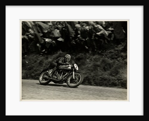 Nick Nicholson riding Norton number 2, Kate's Cottage, 1953 Senior TT (Tourist Trophy) by T.M. Badger