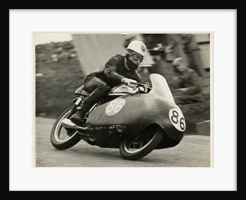 John Hartle, riding a Norton (number 86), 1957 Junior TT (Tourist Trophy) by T.M. Badger