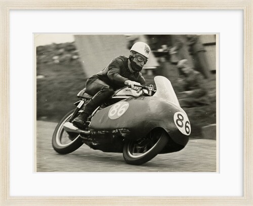 John Hartle, riding a Norton (number 86), 1957 Junior TT (Tourist Trophy) by T.M. Badger