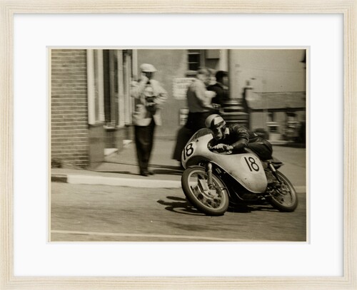 Fron Purslow, aboard 124cc Ducati (number 18), 1958 125 TT (Tourist Trophy) by T.M. Badger