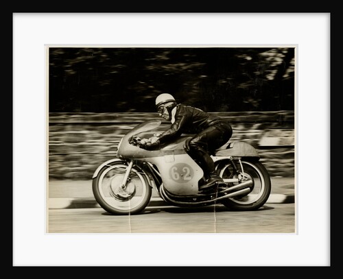 John Surtees, riding as number 62, 1958 Junior TT (Tourist Trophy) by T.M. Badger