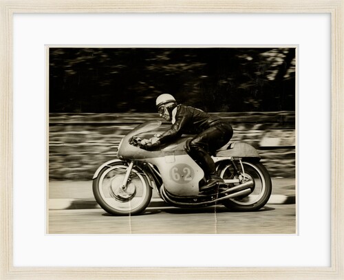 John Surtees, riding as number 62, 1958 Junior TT (Tourist Trophy) by T.M. Badger