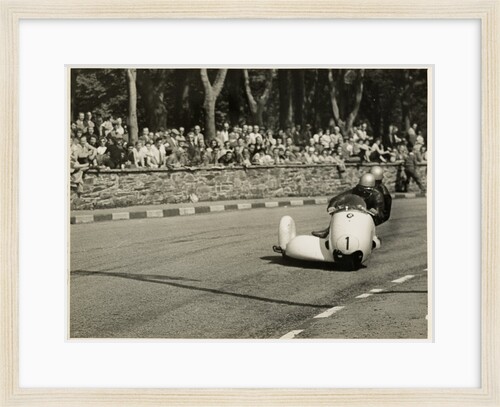 Walter Schneider aboard a BMW sidecar outfit (number 1), 1958 Sidecar TT (Tourist Trophy) by T.M. Badger