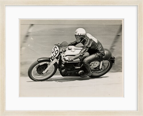 Ray Amm, TT (Tourist Trophy) rider, riding a Norton (number 59) by T.M. Badger