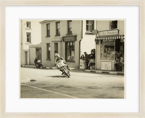 TT (Tourist Trophy) rider number 26 passing through Onchan by T.M. Badger