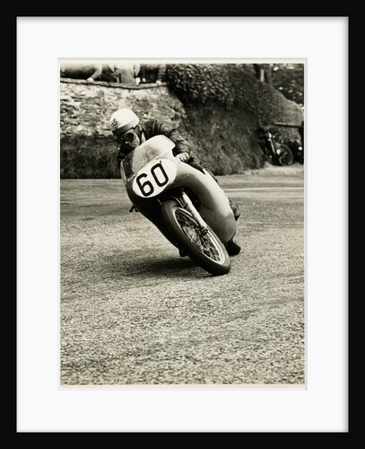 Eric Hinton, TT (Tourist Trophy) rider, riding 500cc Norton (number 60) by T.M. Badger