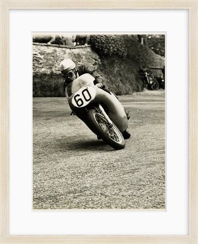 Eric Hinton, TT (Tourist Trophy) rider, riding 500cc Norton (number 60) by T.M. Badger