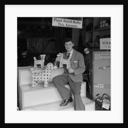 'Chap with Cigarette Packet Dogs' by Manx Press Pictures