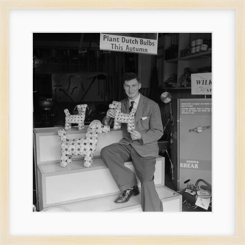 'Chap with Cigarette Packet Dogs' by Manx Press Pictures