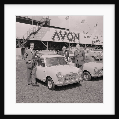 Lieutenant Governor, Sir Ronald Herbert Garvey, with 'roads open' mini motorcar by Manx Press Pictures