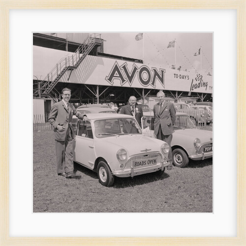 Lieutenant Governor, Sir Ronald Herbert Garvey, with 'roads open' mini motorcar by Manx Press Pictures