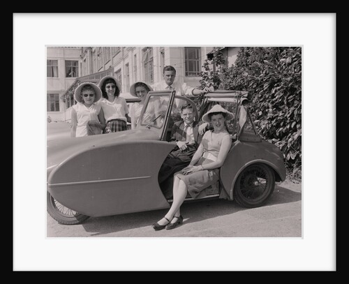 Vehicle and holidaymakers at holiday camp by Manx Press Pictures