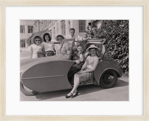Vehicle and holidaymakers at holiday camp by Manx Press Pictures