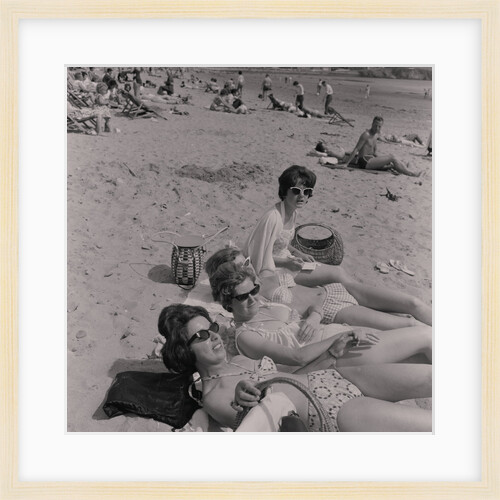 Bank holiday holidaymakers on Douglas beach by Manx Press Pictures
