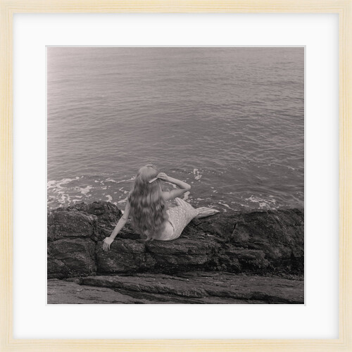 Mermaid on the rocks at Port Soderick by Manx Press Pictures