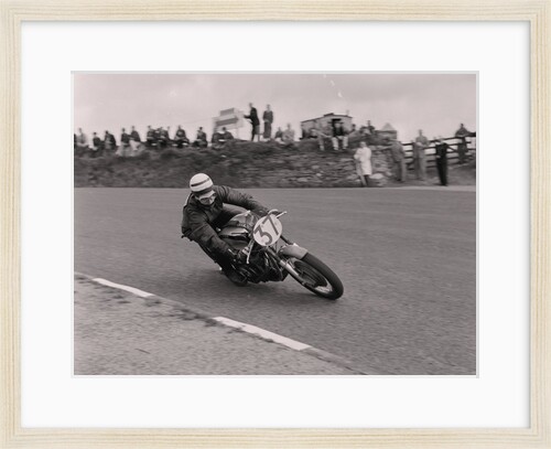 Motorcycle rider no.37 at the Sign Post, (possibly Manx Grand Prix) by Manx Press Pictures