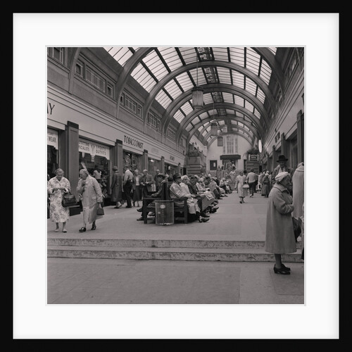 Visitors under the arcade, Douglas by Manx Press Pictures